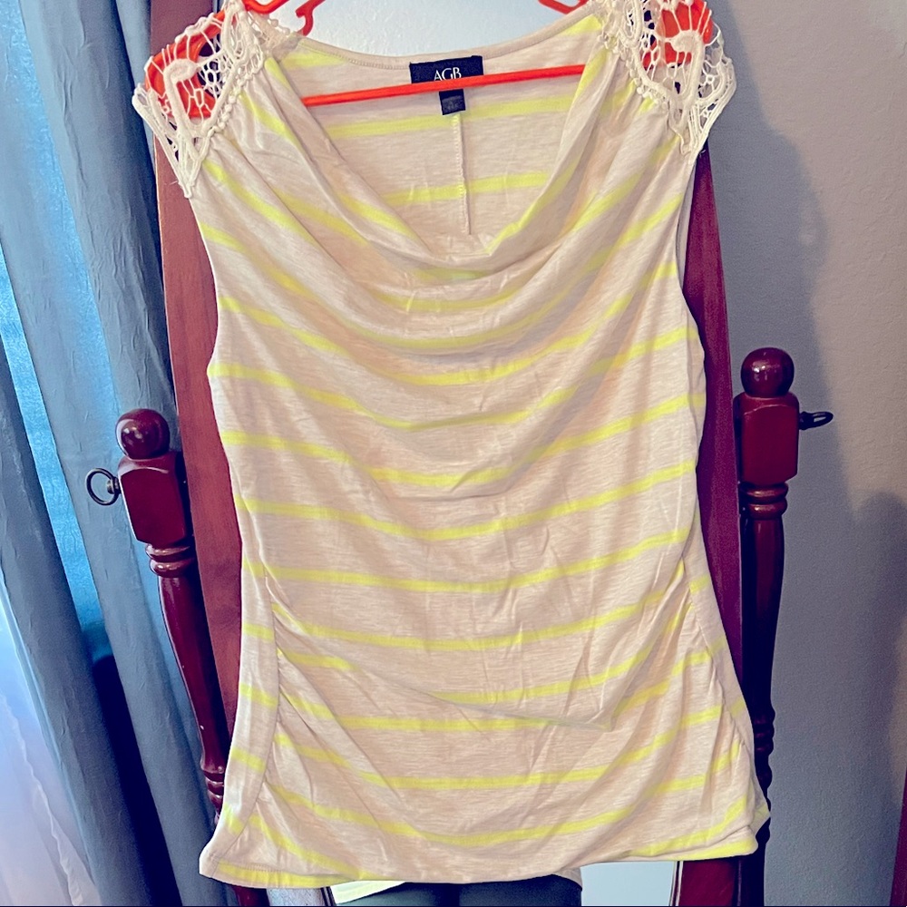 Women top size large tan with yellow stripes